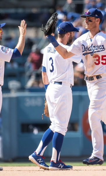 Dozier, Machado lead Dodgers to 3-2 win over Astros